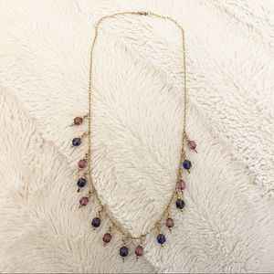 Gold tone beaded necklace